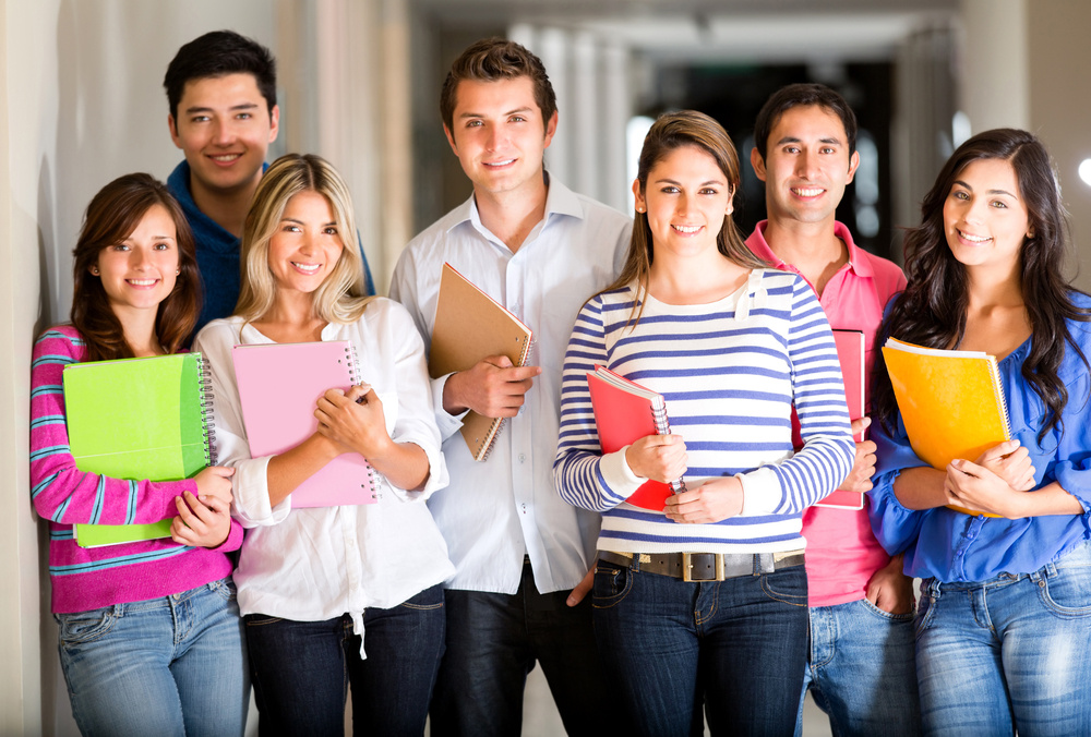 Casual group of students looking happy and smiling