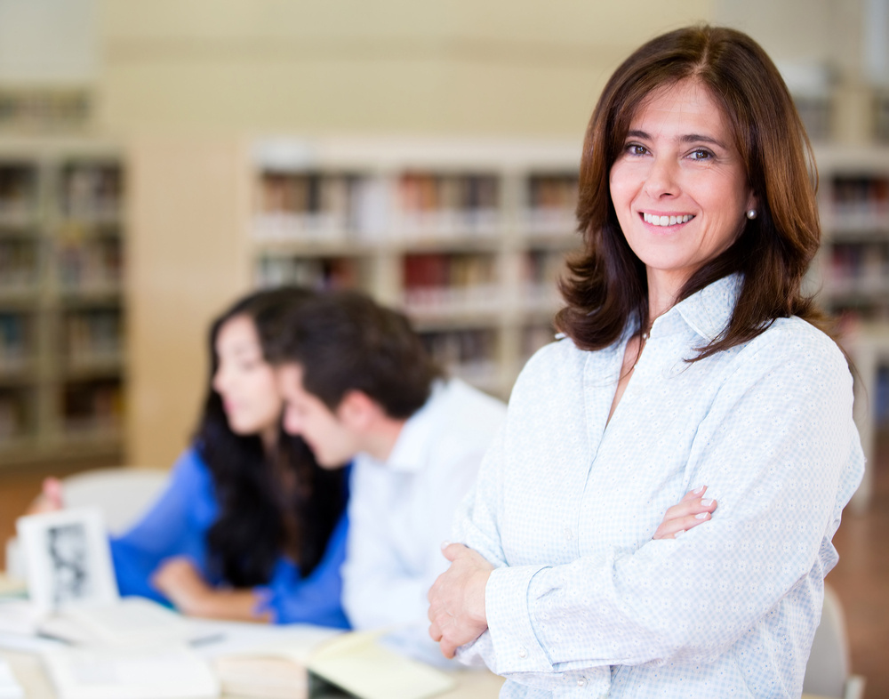 Woman at the library working as a librarian